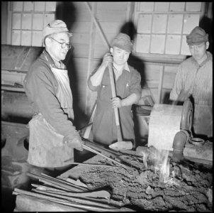 Tule Lake Relocation Center, Newell, California. Evacuee blacksmiths do all the blacksmith work nec . . . - NARA - 536727