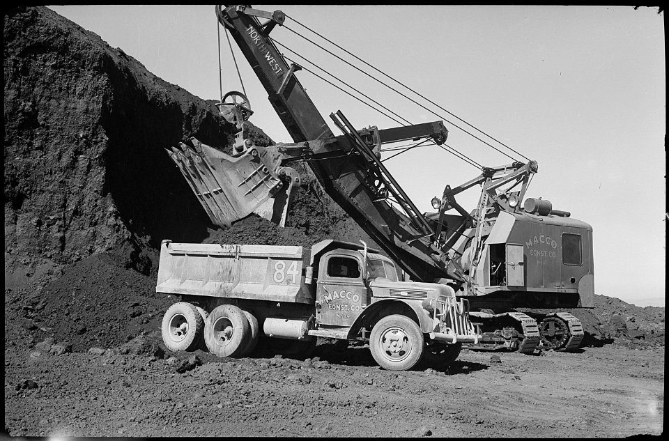Tule Lake Relocation Center, Newell, California. Loading trucks with lava rock. - NARA - 539430