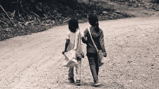 Children walking road photo