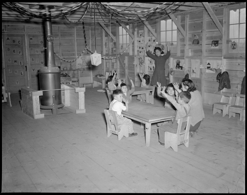 Tule Lake Relocation Center, Newell, California. Nursery school children singing Twinkle, Twinkle, . . . - NARA - 536503