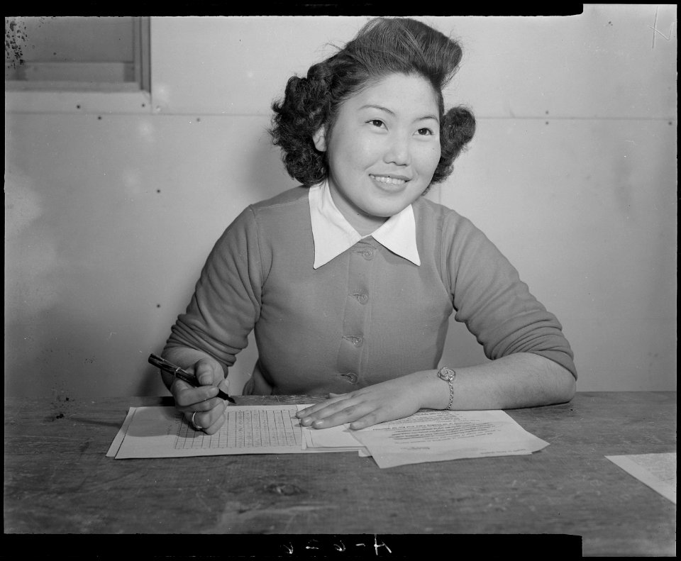 Tule Lake Relocation Center, Newell, California. Mary Oshiro of the Tulean Dispatch, Staff, center . . . - NARA - 536512