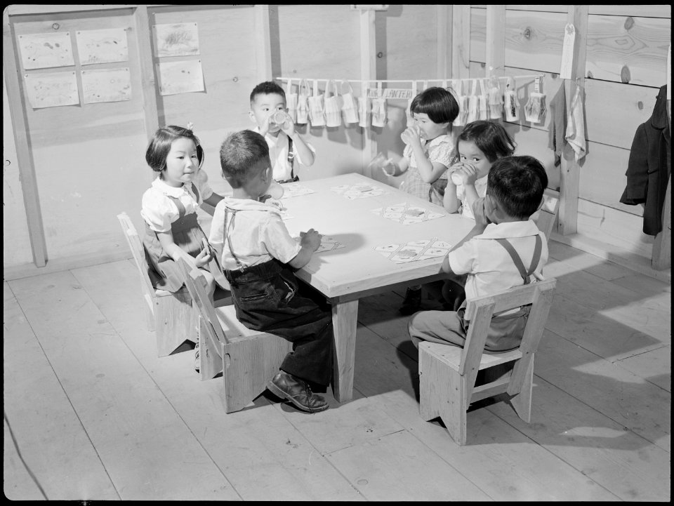 Tule Lake Relocation Center, Newell, California. Milk and cracker time in the nursery school. - NARA - 538349