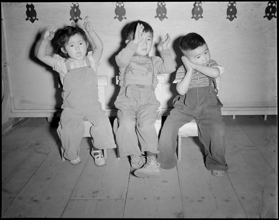 Tule Lake Relocation Center, Newell, California. Nursery School Children singing Twinkle, Twinkle, . . . - NARA - 536505