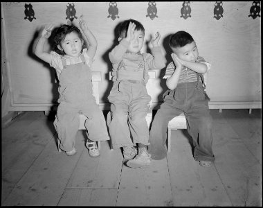 Tule Lake Relocation Center, Newell, California. Nursery School Children singing Twinkle, Twinkle, . . . - NARA - 536505