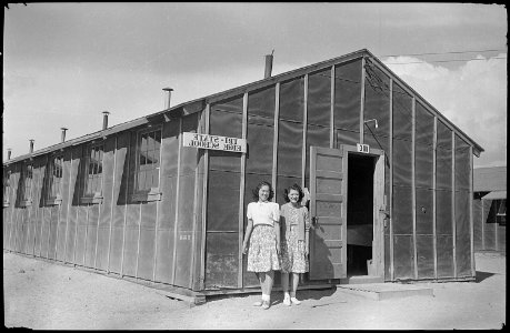 Tule Lake Relocation Center, Newell, California. One of the high school buildings with high school . . . - NARA - 539422