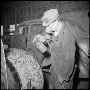 Tule Lake Relocation Center, Newell, California. A view in the paint shop in the garage, at this Re . . . - NARA - 536732 photo