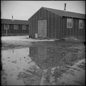 Tule Lake Relocation Center, Newell, California. Thaws turn the streets and firebreaks into seas of . . . - NARA - 536917