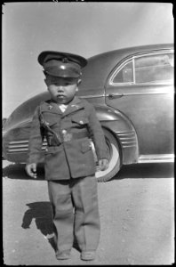Tule Lake Relocation Center, Newell, California. Young Tule Lake citizen on the morning of his depa . . . - NARA - 539417