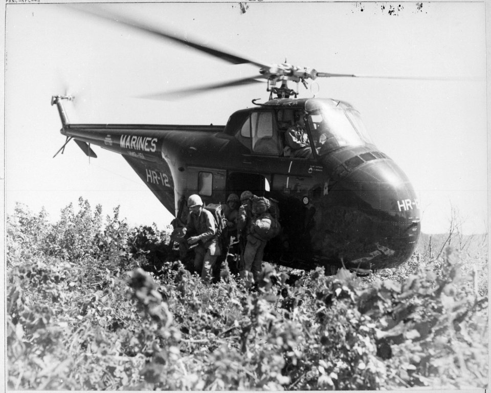 U.S. Marines of the First Marine Division Reconnaissance Company make the first helicopter invasion on Hill 812, to... - NARA - 520805