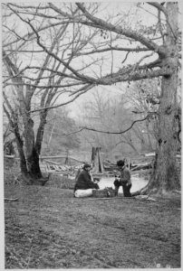 Two photographers having lunch in the Bull Run area before the second battle, 1862 - NARA - 522912