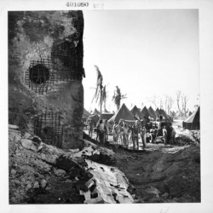 U.S. Marines catching a quick shower in hastily built showers on Namur Island. - NARA - 520721