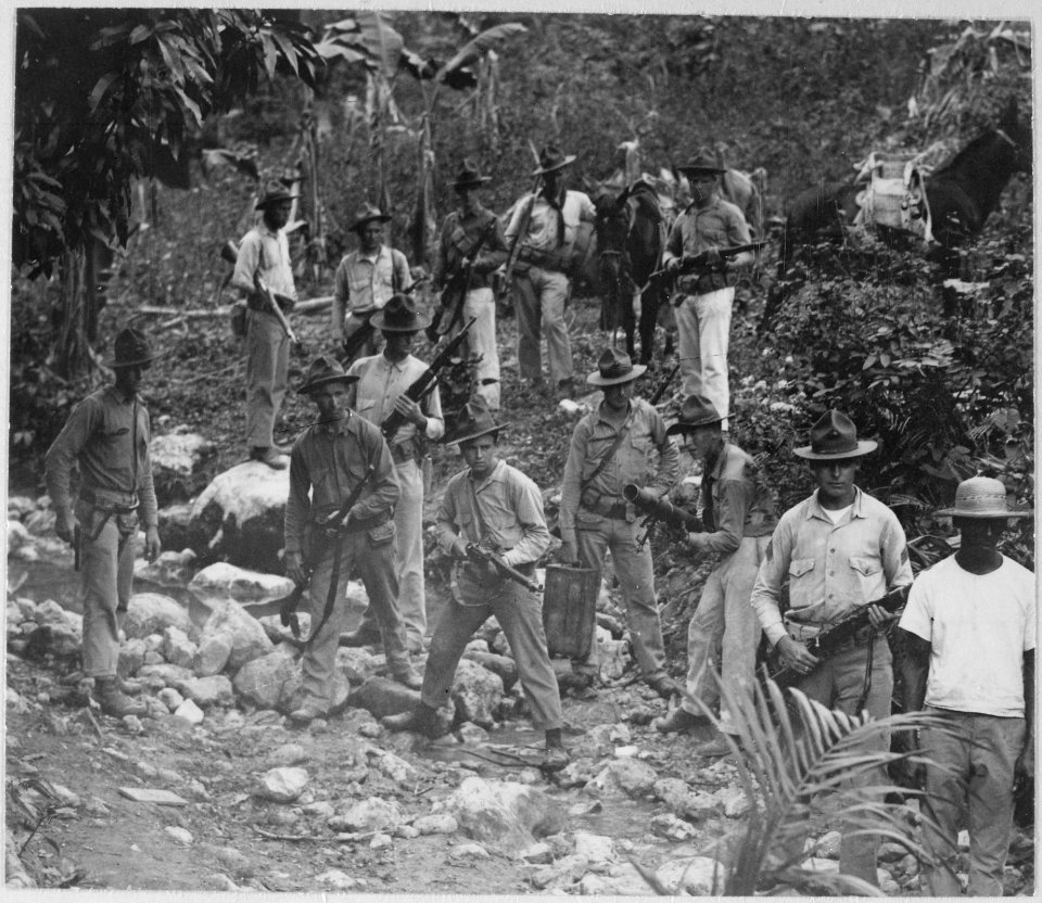 U.S. Marines and guide in search of bandits. Haiti, circa 1919., 1927 - 1981 - NARA - 532584