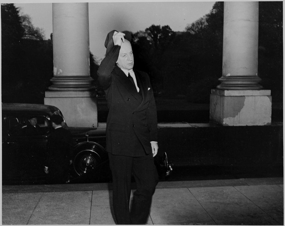 Unidentified man enters the White House during the funeral ceremony for President Franklin D. Roosevelt. - NARA - 199070