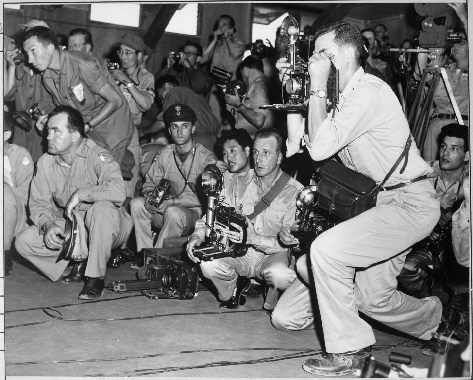 United Nations correspondents at the armistice building, Panmunjom, Korea. - NARA - 520996