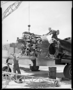 U.S AIR FORCE B-26 GETS NEW ENGINE. This B-26 receives a new engine to put it in top shape for further missions... - NARA - 542197 photo