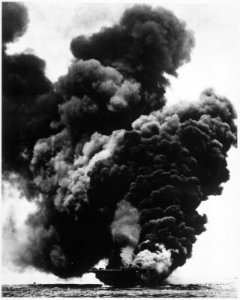 USS BUNKER HILL burning after a Japanese suicide attack. Near Okinawa, May 11, 1945. - NARA - 520657
