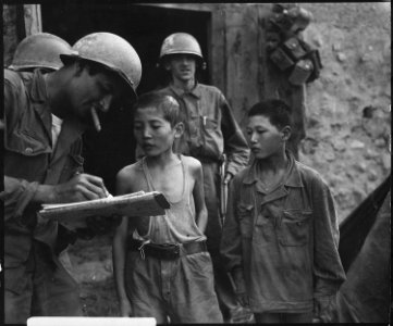 Two North Korean boys, serving in the North Korean Army, taken prisoner in the Sindang-dong area by elements of the... - NARA - 531377