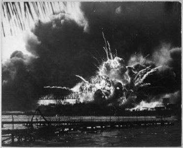 USS SHAW exploding during the Japanese raid on Pearl Harbor, T.H. - NARA - 520590