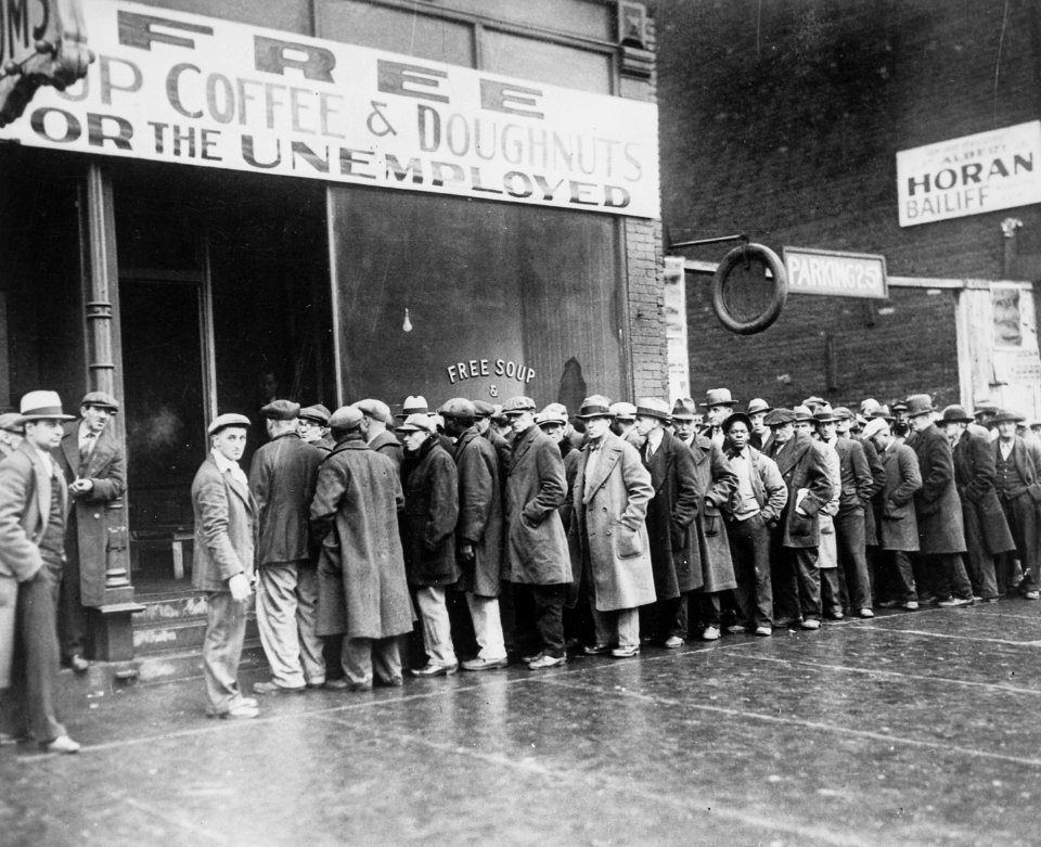 Unemployed men queued outside a depression soup kitchen opened in Chicago by Al Capone, 02-1931 - NARA - 541927 (cropped)