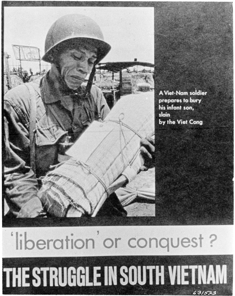 Vietnam. This picture is one that would reach potentially every father in the world. It was used as the cover of a... - NARA - 531444
