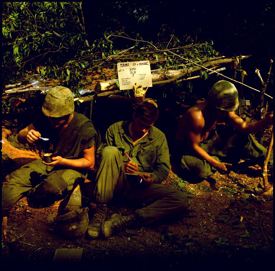Vietnam....Home is where you dig was the sign over the fighting bunker of Private First Class Edward, Private First... - NARA - 532482