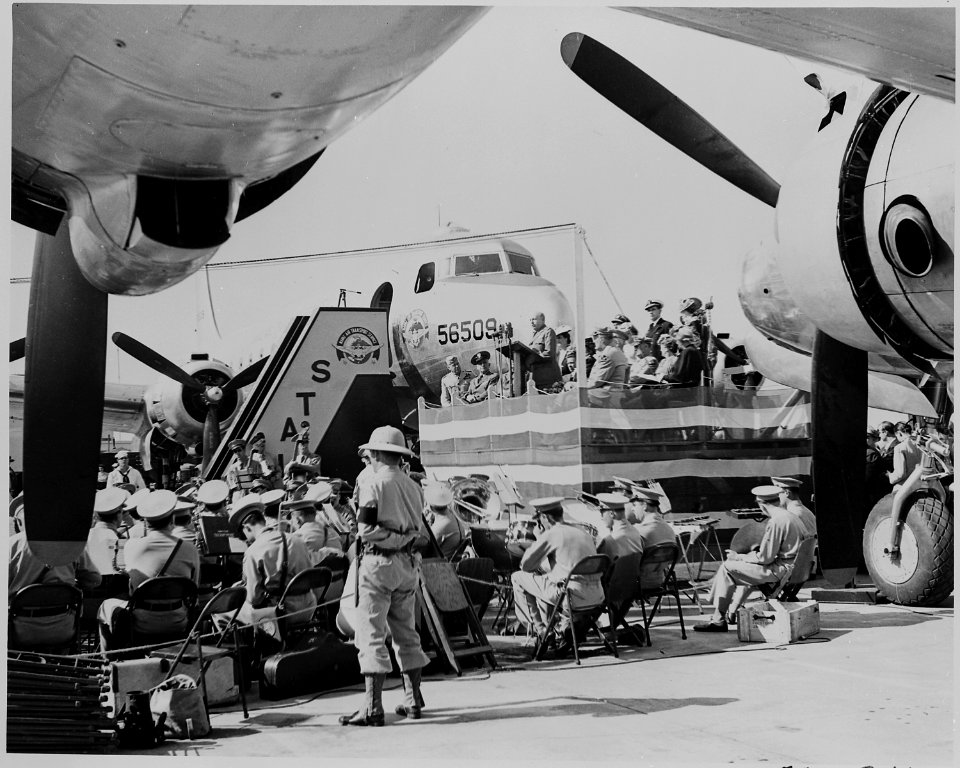 View of two airplanes and speakers platform during the christening ceremony for the airplanes, Bess Truman performed... - NARA - 199099