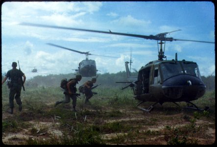 UH-1D helicopters airlift members of the 2nd Battalion, 14th Infantry Regiment from the Filhol Rubber Plantation area... - NARA - 530610 photo