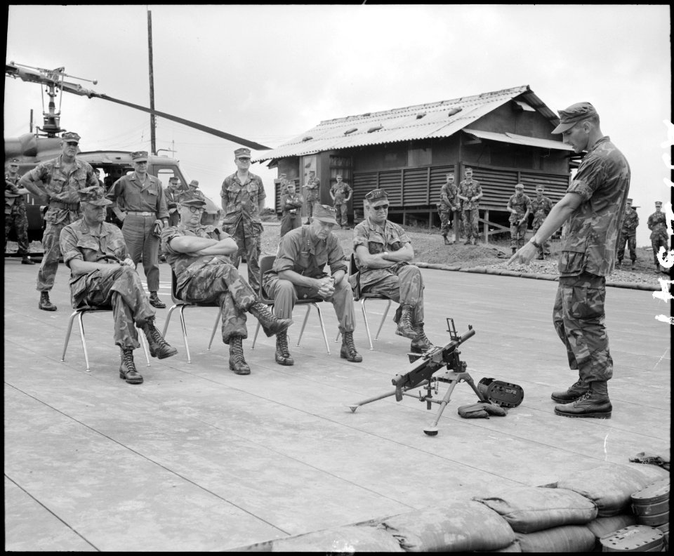Vietnam....Major Joseph Flynn, S-3, 26th Marine Regiment, explains the specific features of the automatic grenade... - NARA - 532487