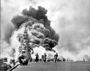 USS BUNKER HILL hit by two Kamikazes in 30 seconds on 11 May 1945 off Kyushu. Dead-372. Wounded-264., 1943 - 1958 - NARA - 520678