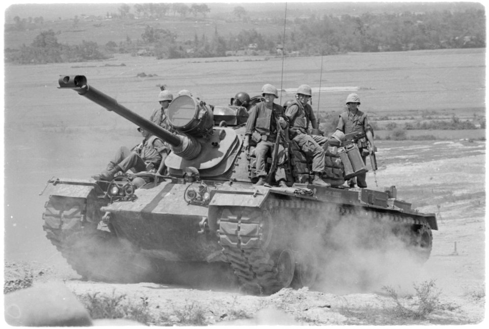 Vietnam. Marines of E Company, 2nd Battalion, 3rd Marines, riding on an M-48 tank. - NARA - 532441