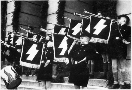 Weihestunde der HJ vor dem Rathaus in Tomaschow am 11.5.1941. Hitler Youth Hour of Commemoration in front of the Town... - NARA - 540131