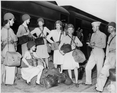 War correspondents and personnel of the Office of Strategic Services, leaving from the Railhead, Camp Patrick Henry... - NARA - 542171 photo