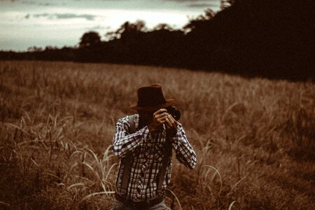 Photographer grass field