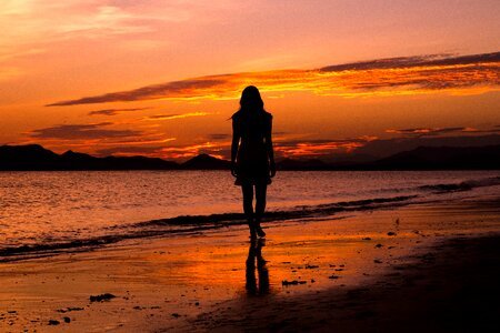 Beach woman silhouette photo