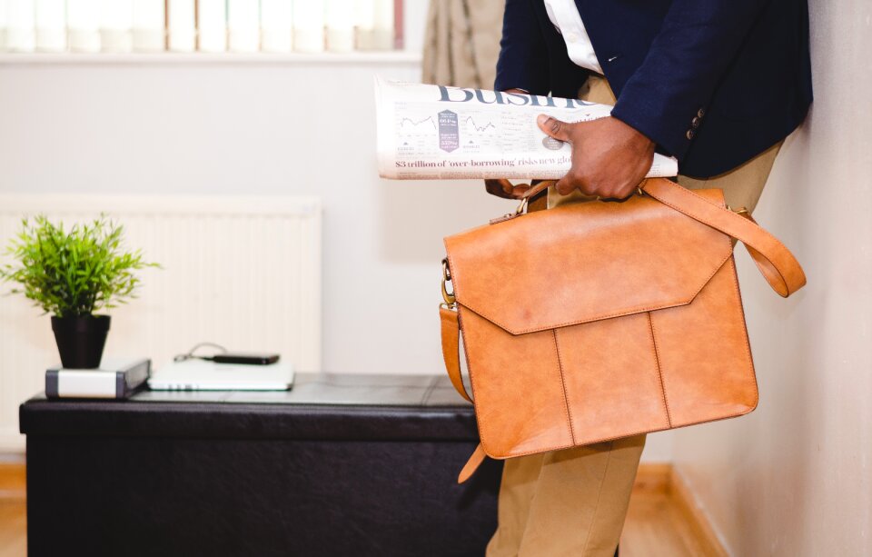 Newspaper leather bag