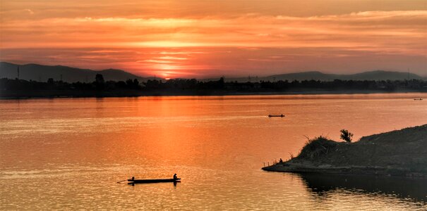Sunset fishing boats boat