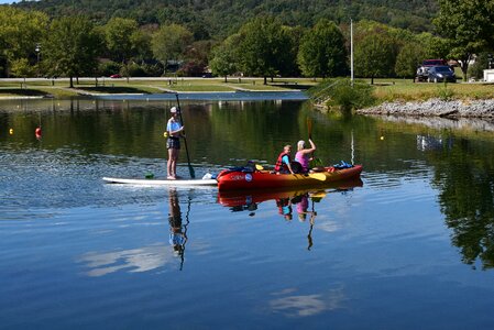 Paddle board children mother