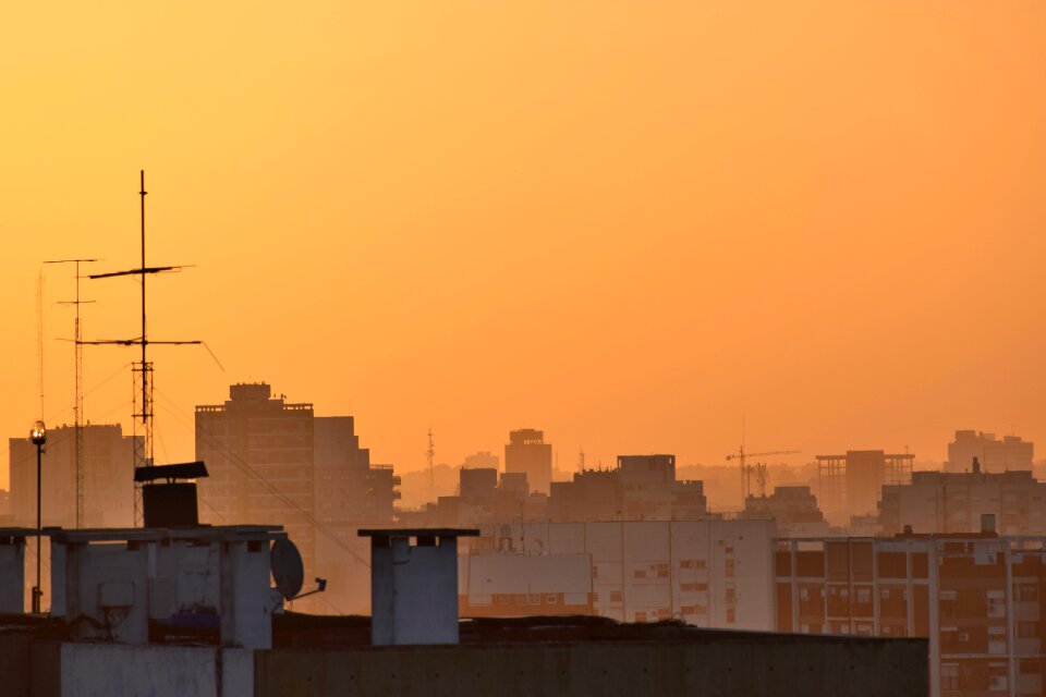 Orange partly cloudy dusk
