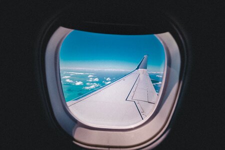 Plane window trip photo