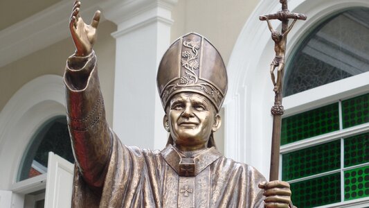 Statue pope hand rising