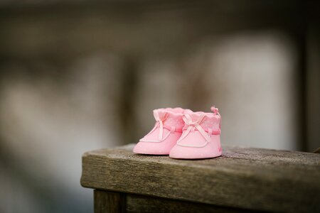 Baby shoes wooden photo