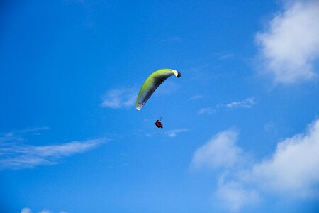 Blue parachuting parachutist