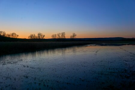 Dawn sky lake photo