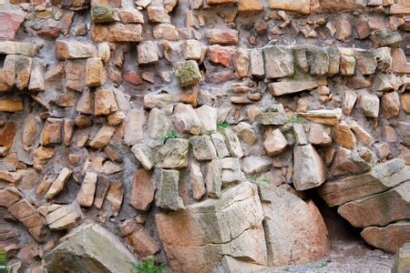 Firewood old stone photo