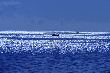 Sea blue fisherman photo