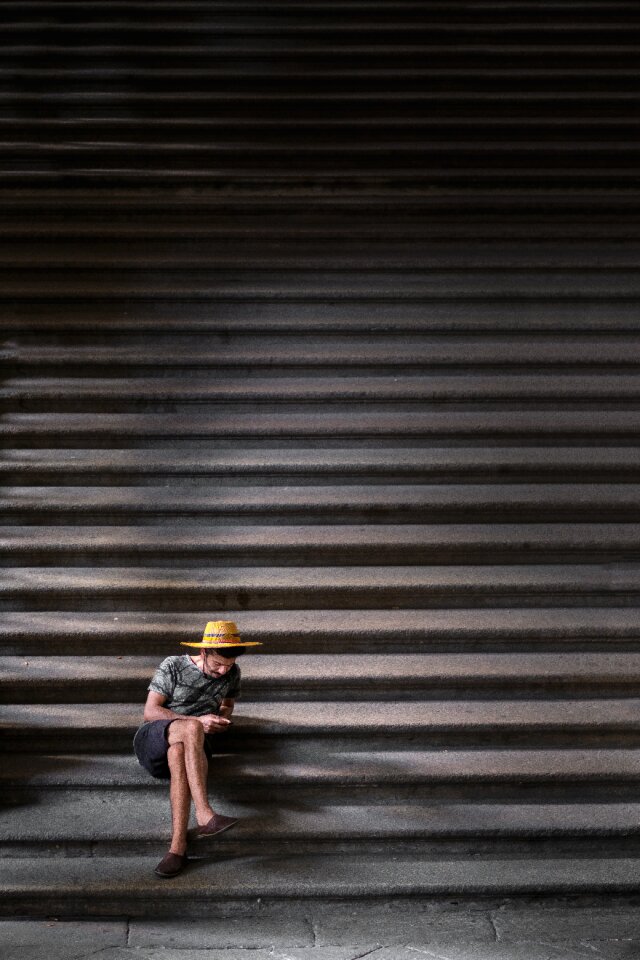 Man alone sitting