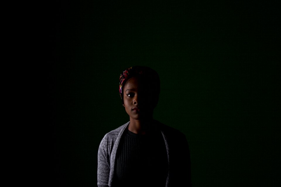 Woman girl black room
