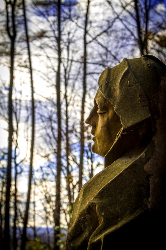 Autumn statue view over shoulder