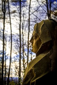 Autumn statue view over shoulder