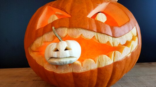 Creepy autumn pumpkin face photo